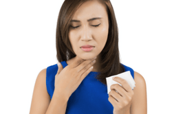 woman experiencing cold flu symptoms from indoor air